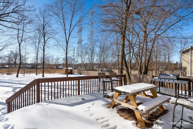 view of snow covered deck