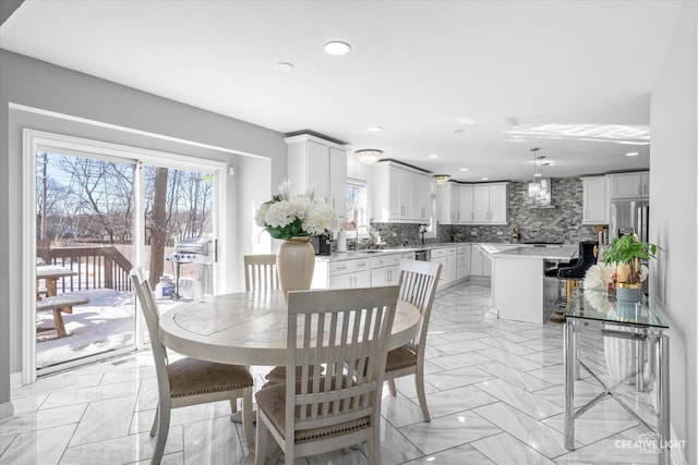 dining area with recessed lighting