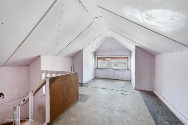 additional living space with lofted ceiling