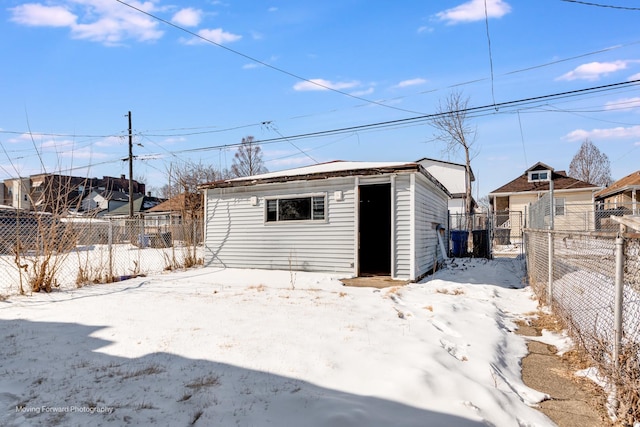 exterior space with fence and an outdoor structure