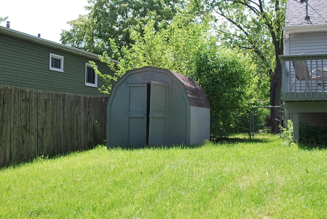 view of shed featuring a fenced backyard