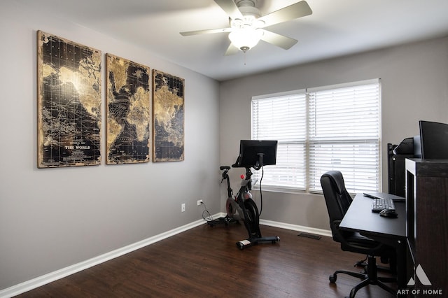 home office featuring dark wood-style floors, ceiling fan, and baseboards