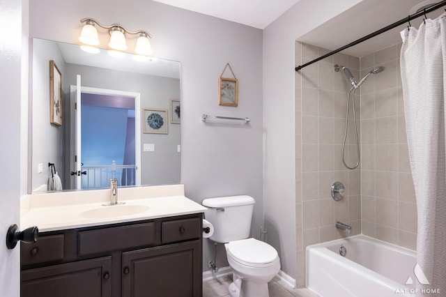 bathroom featuring toilet, shower / bath combo, baseboards, and vanity