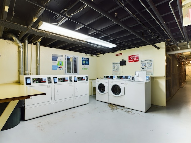 shared laundry area with separate washer and dryer