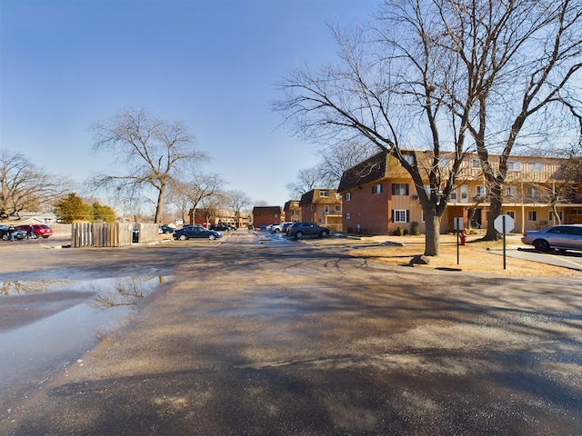 view of street featuring traffic signs and a residential view