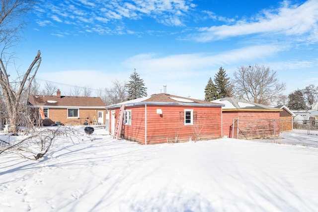 view of snow covered property