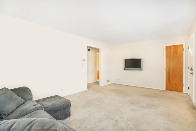 living room featuring light carpet