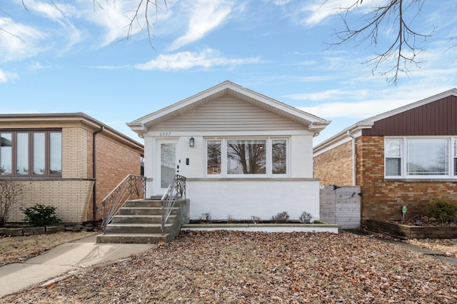 view of front of property featuring brick siding