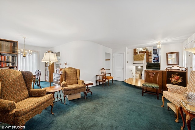 sitting room with carpet floors and a notable chandelier