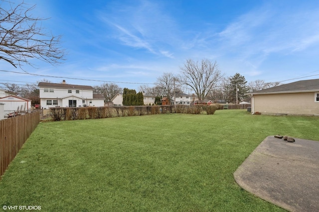 view of yard with a fenced backyard