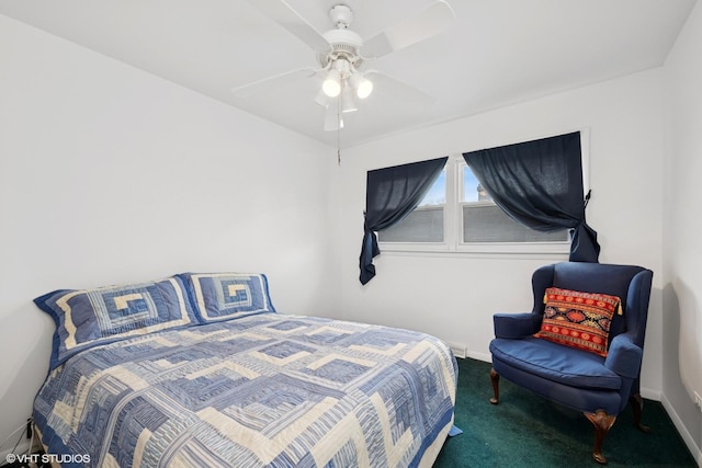 bedroom featuring ceiling fan, carpet, and baseboards