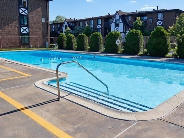 pool featuring fence