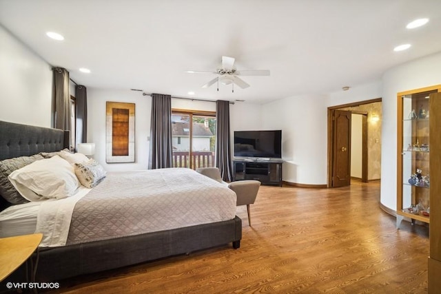 bedroom featuring recessed lighting, ceiling fan, baseboards, and wood finished floors