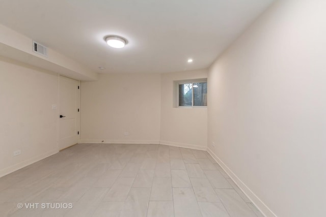 interior space with baseboards and visible vents