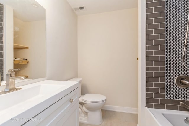 bathroom featuring baseboards, visible vents, toilet, shower / tub combination, and vanity