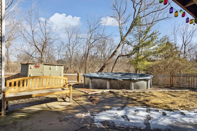 wooden terrace with fence and a fenced in pool