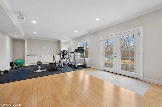 workout area with ornamental molding, french doors, wood finished floors, and recessed lighting