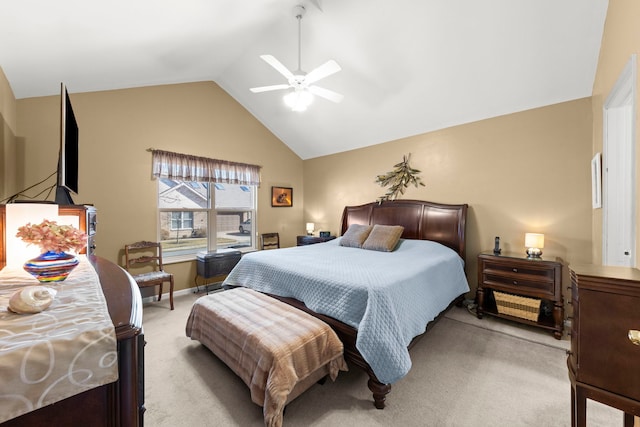 bedroom featuring light carpet, vaulted ceiling, baseboards, and ceiling fan