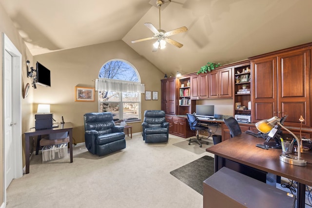 home office with light carpet, baseboards, high vaulted ceiling, and a ceiling fan