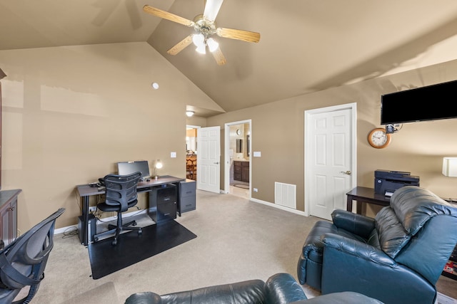 carpeted office featuring ceiling fan, high vaulted ceiling, visible vents, and baseboards