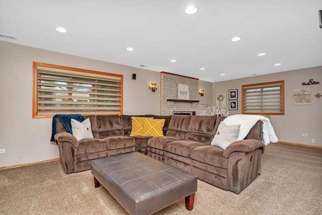 living room featuring carpet floors, recessed lighting, visible vents, and baseboards