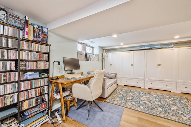 office area with recessed lighting and light wood-style floors