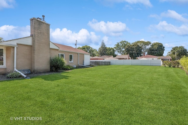 view of yard with fence