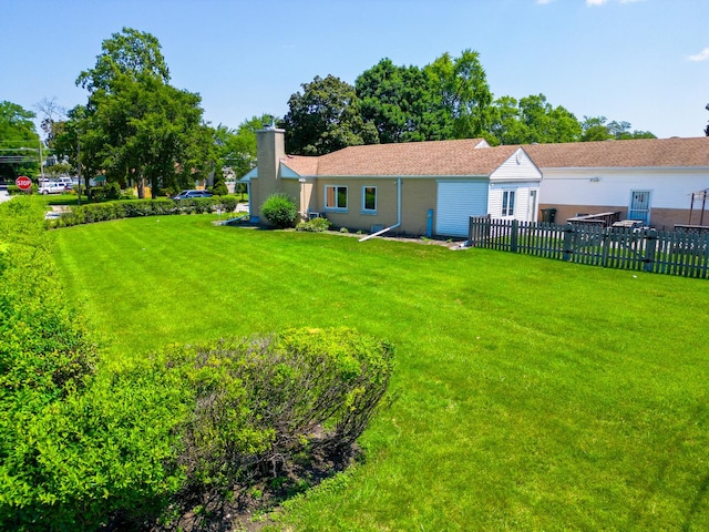 view of yard with fence