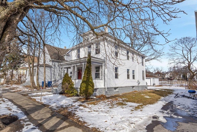 view of snow covered property