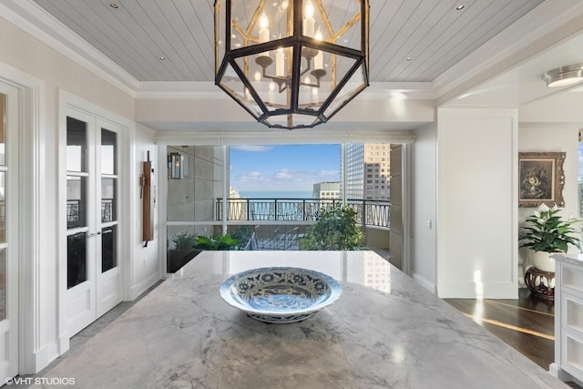 interior space featuring french doors and a balcony