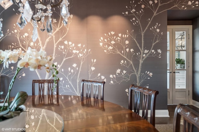 dining area featuring baseboards