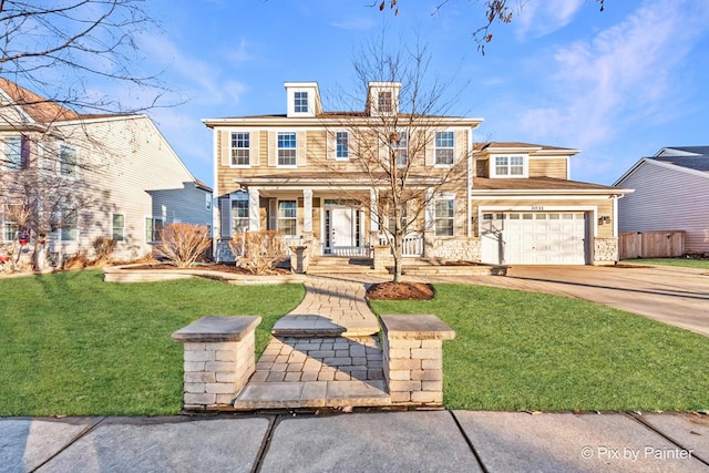 view of front facade with concrete driveway, covered porch, an attached garage, a front yard, and fence