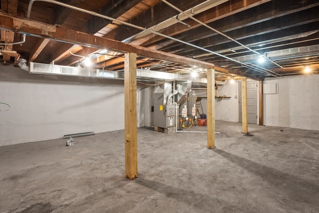 unfinished basement with heating unit