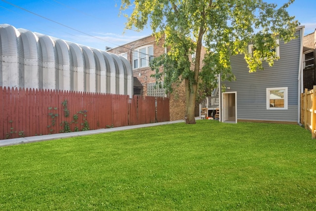 view of yard with fence