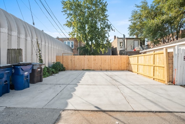 view of patio featuring fence