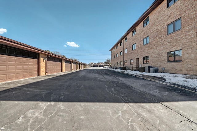 view of road with community garages