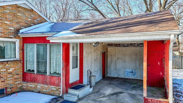 exterior space with a carport