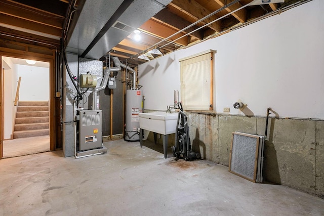 unfinished basement featuring gas water heater, a sink, visible vents, stairway, and heating unit