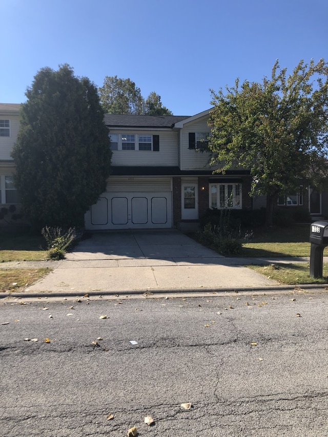 view of front of house with driveway and an attached garage