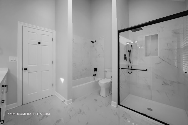 bathroom with toilet, vanity, baseboards, marble finish floor, and a marble finish shower