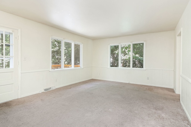 831 W Galena Blvd, Aurora, IL 60506 - carpeted spare room with wainscoting and a decorative wall
