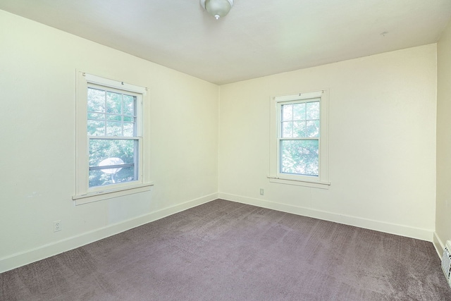 831 W Galena Blvd, Aurora, IL 60506 - spare room featuring healthy amount of natural light and dark carpet