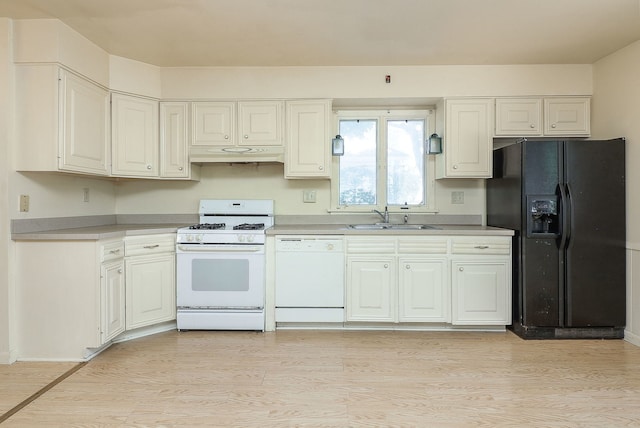 831 W Galena Blvd, Aurora, IL 60506 - kitchen with white appliances, light countertops, light wood-style flooring, under cabinet range hood, and white cabinets
