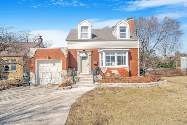 new england style home with a front yard, fence, driveway, a chimney, and a garage