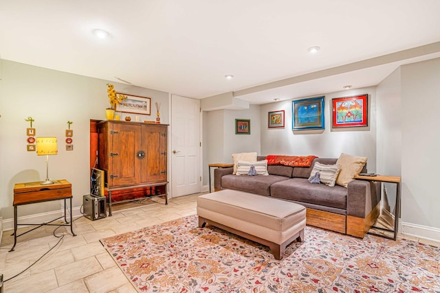 living room featuring recessed lighting and baseboards