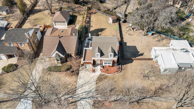 birds eye view of property with a residential view