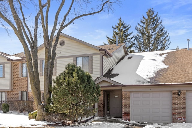 view of front of house with brick siding