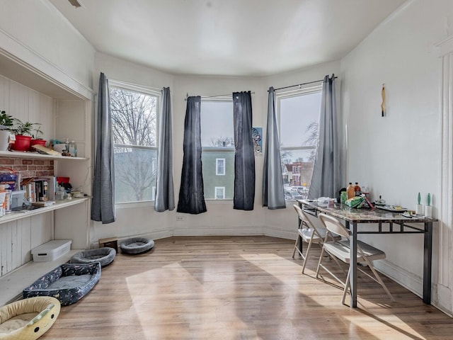 office space featuring wood finished floors and baseboards