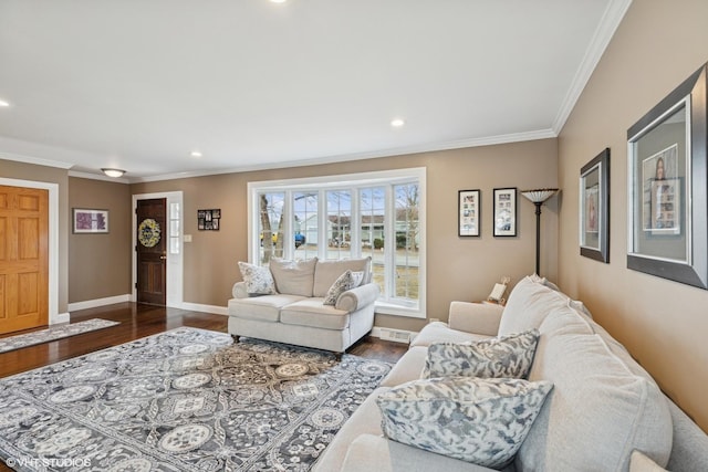 living area featuring dark wood-style floors, ornamental molding, and baseboards