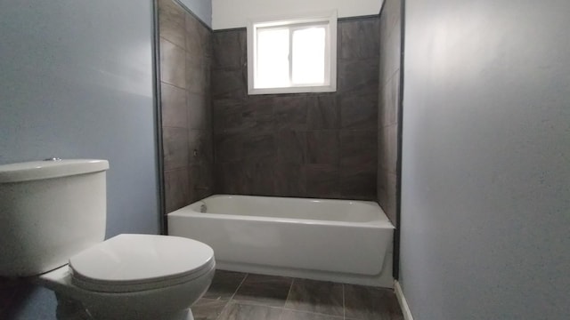 full bathroom with shower / bathing tub combination and toilet